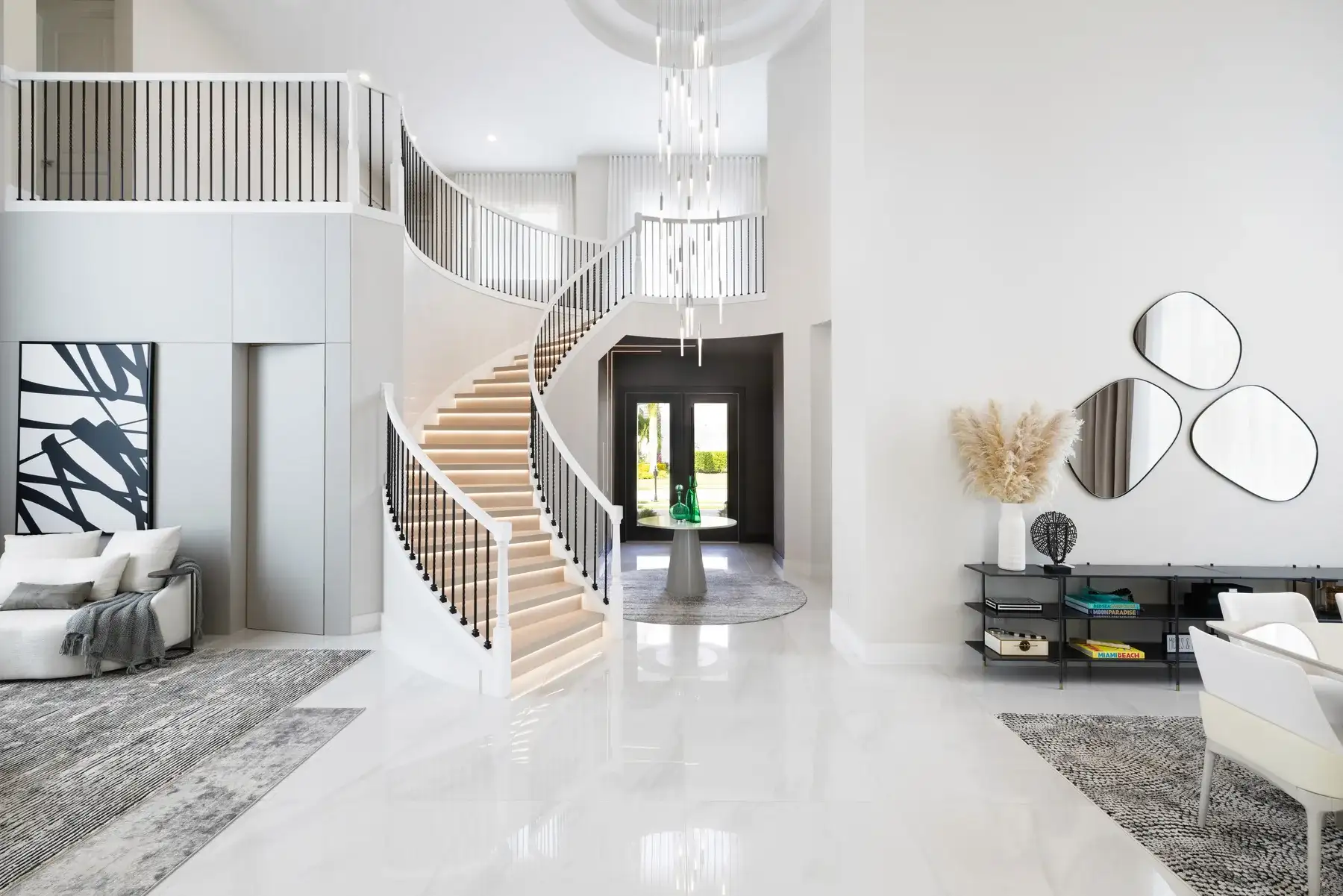 Dining room in the Coconut Grove residence with chandelier and white stone table