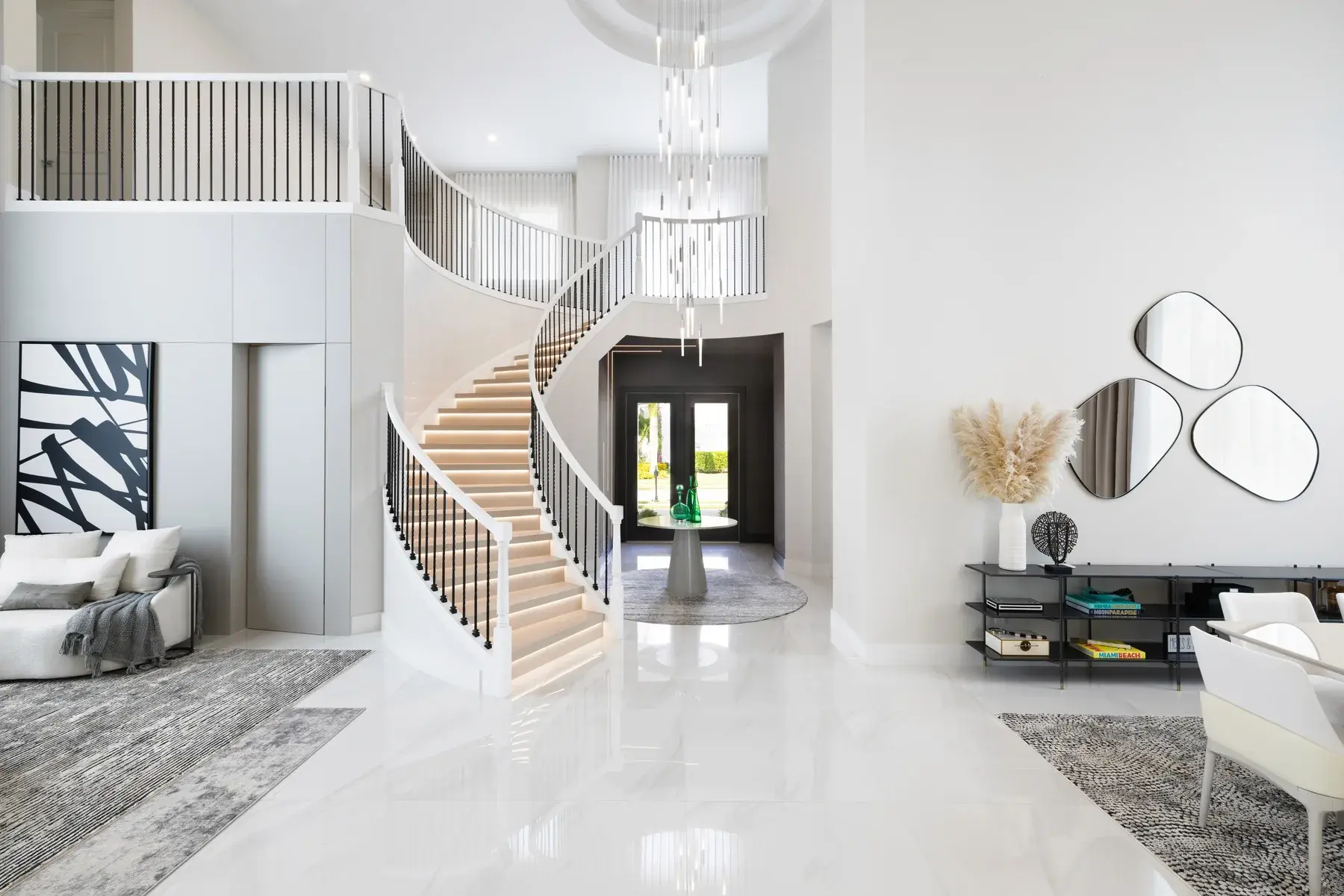 Dining room in the Boca Raton residence with chandelier and white stone table