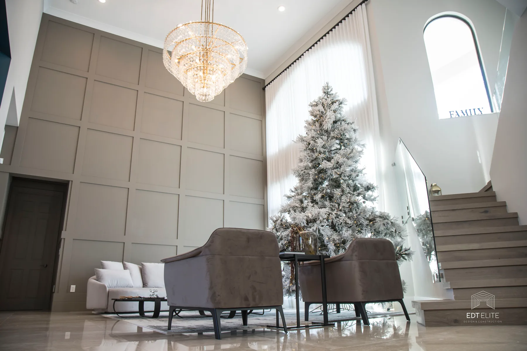 Living salon in the Star Island residence with layered neutral seating and natural light