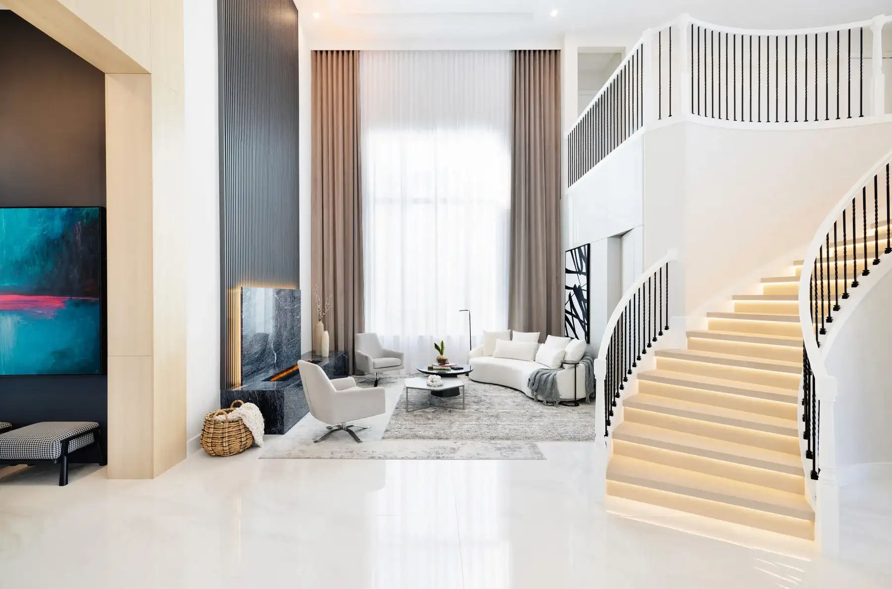 Double-height living room with a wood feature wall, sculptural staircase and integrated media wall