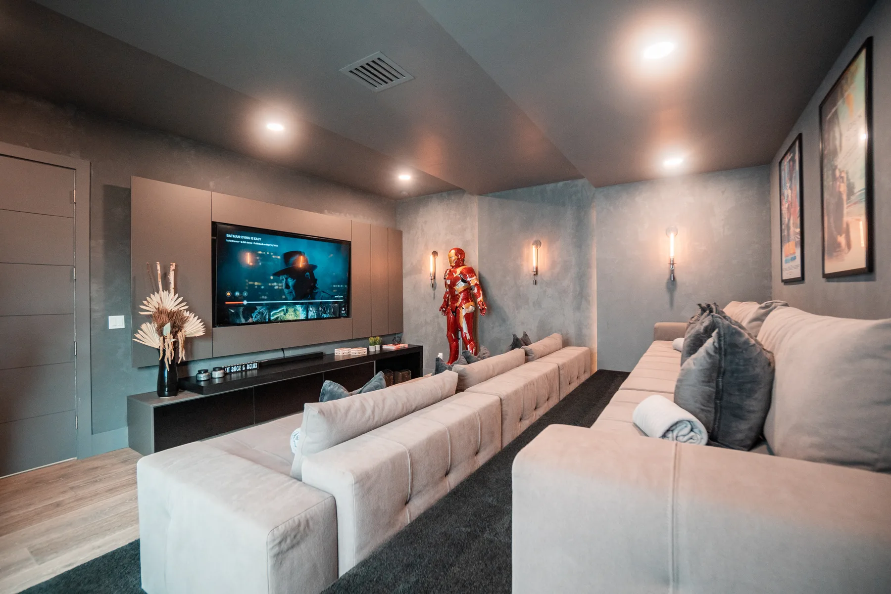Media room with built-in display niches and lounge seating